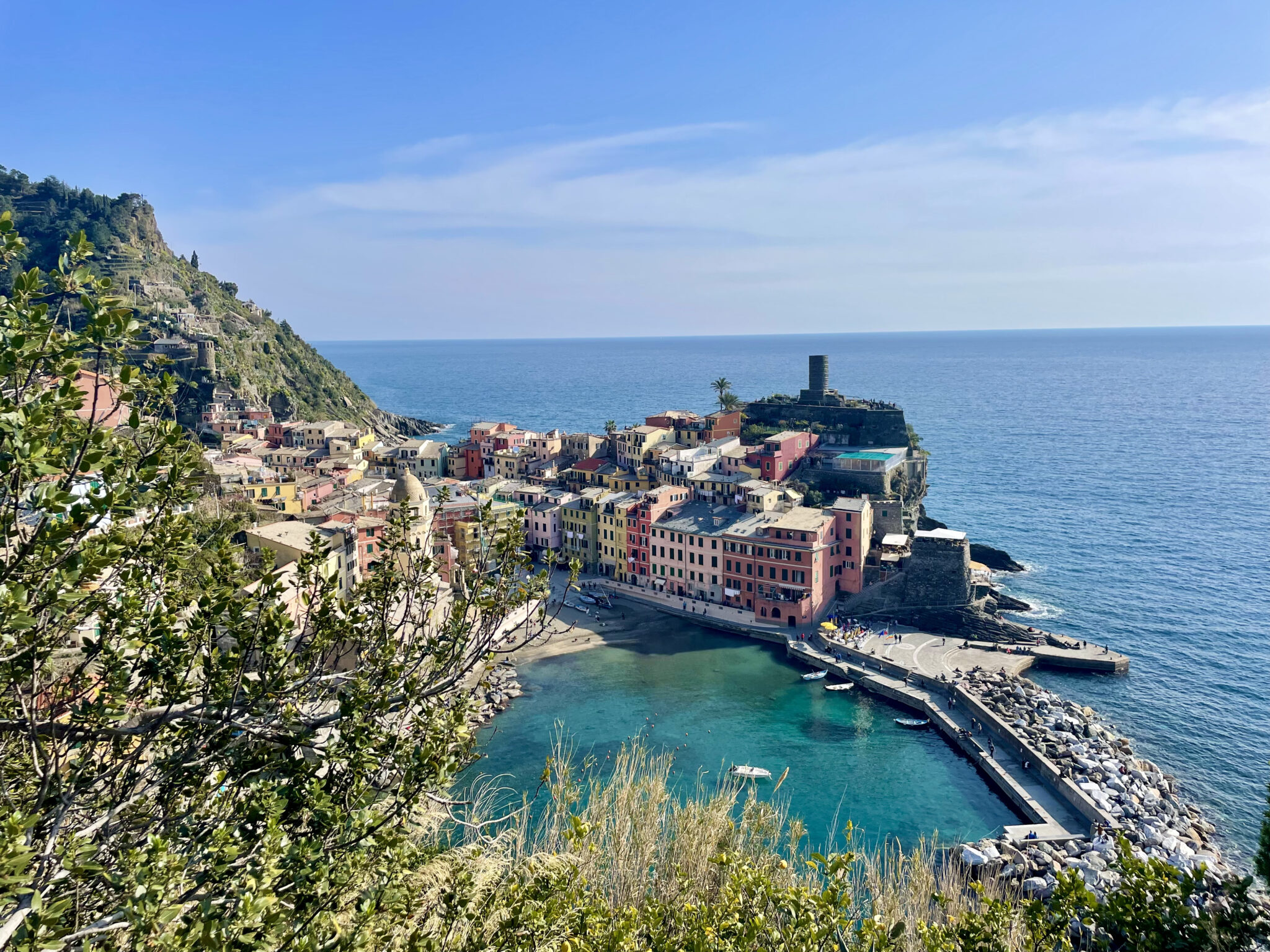 Looking out at the pastel buildings from the footpath from Vernazza to Monterosso 