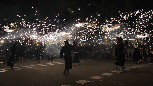 The correfoc (“fire run”) has devils who set off fireworks to demonstrate the fight between Good and Evil during the Catalan celebration of La Mercè.
