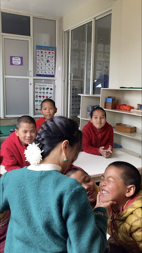Young nuns from Tsoknyi Ling nunnery in a classroom.
