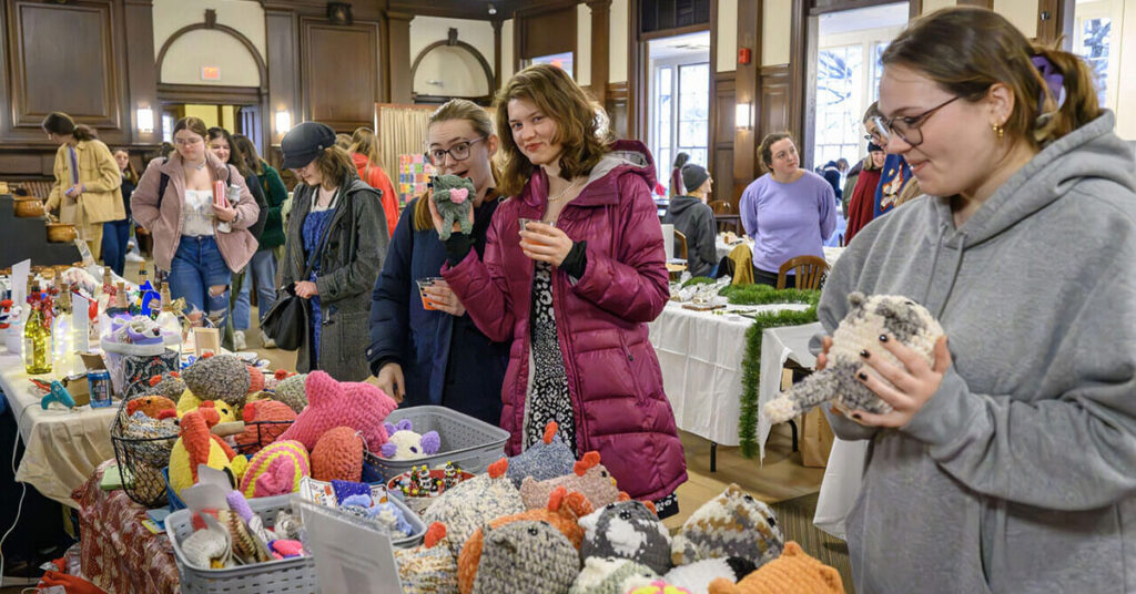 Individuals shopping for stuffed animals